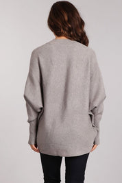 Back view of the Celeste Cozy Pullover showcasing relaxed fit and dolman sleeves in soft gray.