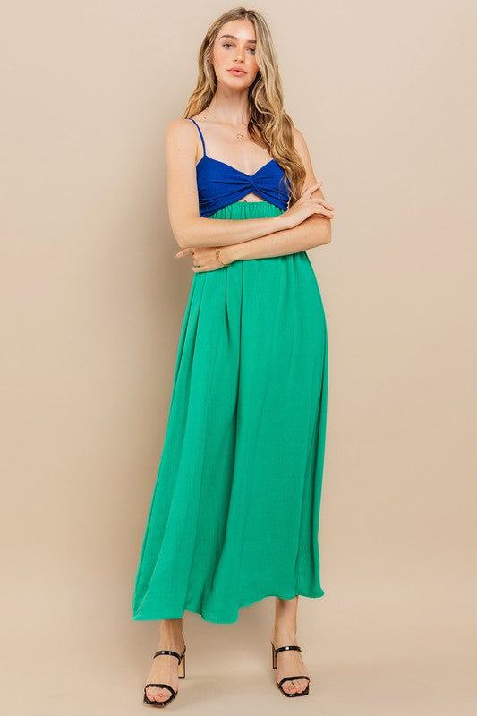 Clara Colourblock Dress featuring a blue and green colorblock design, sleeveless style, and twist-front detail.