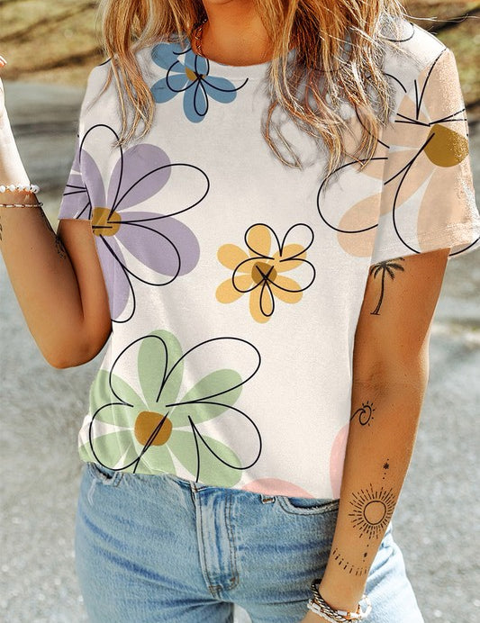 Sophia Summer Floral TeeElevate your summer wardrobe with the Sophia Summer Floral Tee, a stylish essential adorned with a vibrant flower print. Crafted from a soft and breathable fabric blend, this tee ensures all-day comfort and effortless style. The ca