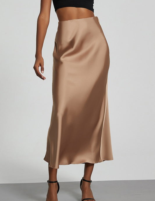 Celeste Satin Skirt in beige, featuring a sleek A-line design perfect for day or night styling.