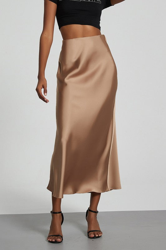 Celeste Satin Skirt in beige, featuring a sleek A-line design perfect for day or night styling.