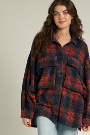 Indie Plaid Shacket with cozy, oversized fit featuring a fuzzy plaid design, perfect for layering in casual outings.