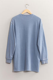 Clara Cozy CrewEmbrace cozy comfort with the Clara Cozy Crew, an oversized sweatshirt dress designed for a relaxed fit. This dress features dropped shoulders and long sleeves, making it perfect for lounging or casual outings. The soft, washed fabric adds