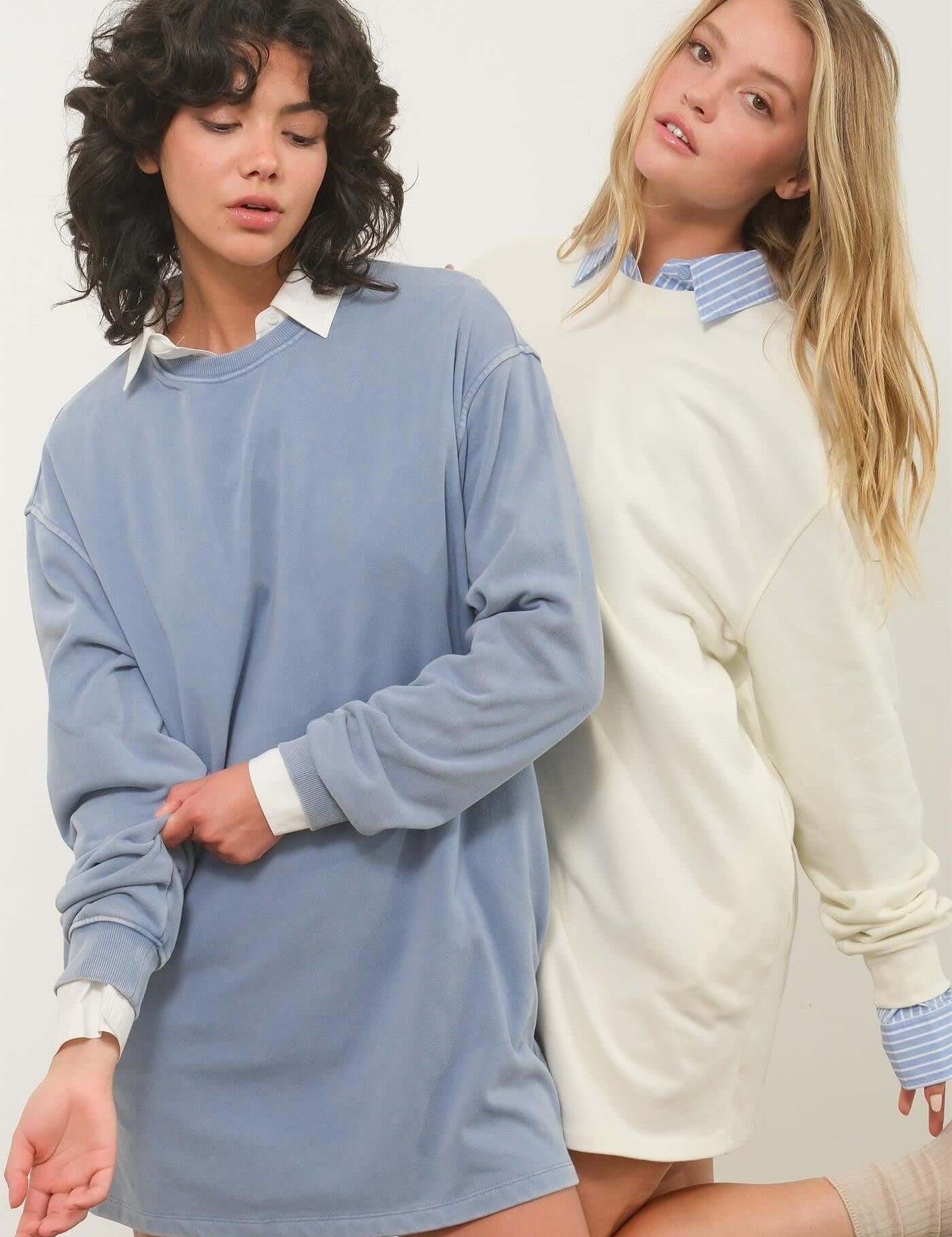 Clara Cozy CrewEmbrace cozy comfort with the Clara Cozy Crew, an oversized sweatshirt dress designed for a relaxed fit. This dress features dropped shoulders and long sleeves, making it perfect for lounging or casual outings. The soft, washed fabric adds