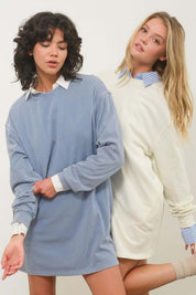 Clara Cozy CrewEmbrace cozy comfort with the Clara Cozy Crew, an oversized sweatshirt dress designed for a relaxed fit. This dress features dropped shoulders and long sleeves, making it perfect for lounging or casual outings. The soft, washed fabric adds