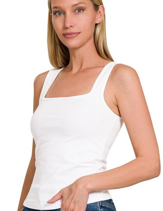 Chloe Square Neck TankThe Chloe Square Neck Top is a must-have for your summer wardrobe! This cotton cropped top features a chic square neckline and a flattering, fitted silhouette. Crafted from high-quality cotton, it ensures comfort and durability for e