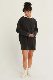 Clara Cozy CrewEmbrace cozy comfort with the Clara Cozy Crew, an oversized sweatshirt dress designed for a relaxed fit. This dress features dropped shoulders and long sleeves, making it perfect for lounging or casual outings. The soft, washed fabric adds