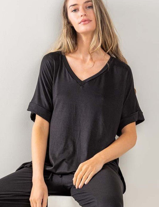 Day Tripper Lounge SetCrafted for comfort and versatility, this coordinated ensemble is perfect for both casual outings and relaxed days at home. The Wide Leg Pants feature a soft and breathable fabric, offering a relaxed fit that flatters all body types.