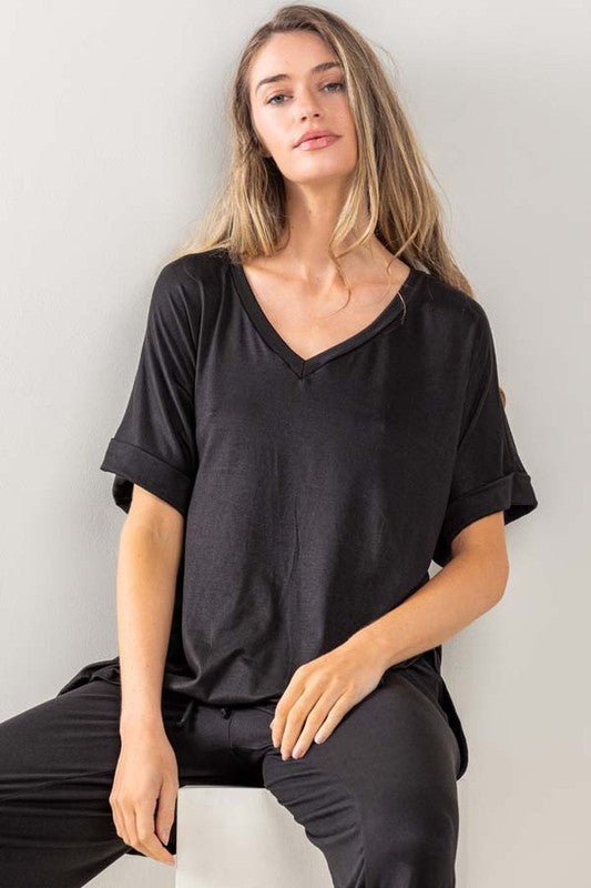 Day Tripper Lounge SetCrafted for comfort and versatility, this coordinated ensemble is perfect for both casual outings and relaxed days at home. The Wide Leg Pants feature a soft and breathable fabric, offering a relaxed fit that flatters all body types.