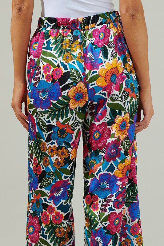 Elena Wide Leg PantKeep your look breezy and cute on your next vacation with the Santa Elena Floral Wide Leg Pants! An elastic waistband hugs the waist while sitting high. The pant legs open up to create the perfect wide leg fit. Style them with different