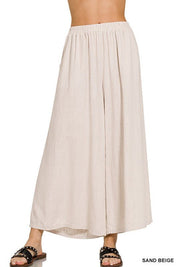 Florence Wide Leg PantIntroducing our Florence Woven Pleated Linen Blend Wide Leg Pants, a chic and versatile addition to your wardrobe. Crafted from a premium linen blend, these pants offer both style and comfort for any occasion. Featuring a flattering