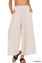 Florence Wide Leg PantIntroducing our Florence Woven Pleated Linen Blend Wide Leg Pants, a chic and versatile addition to your wardrobe. Crafted from a premium linen blend, these pants offer both style and comfort for any occasion. Featuring a flattering