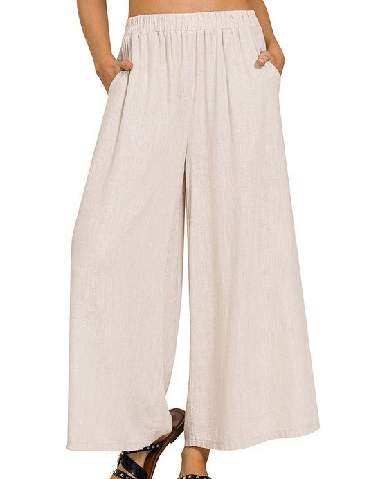 Florence Wide Leg PantIntroducing our Florence Woven Pleated Linen Blend Wide Leg Pants, a chic and versatile addition to your wardrobe. Crafted from a premium linen blend, these pants offer both style and comfort for any occasion. Featuring a flattering