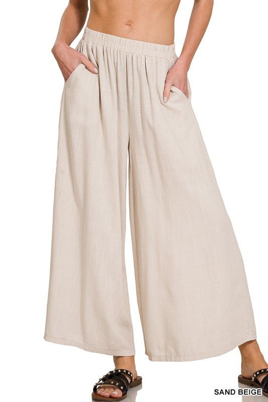 Florence Wide Leg PantIntroducing our Florence Woven Pleated Linen Blend Wide Leg Pants, a chic and versatile addition to your wardrobe. Crafted from a premium linen blend, these pants offer both style and comfort for any occasion. Featuring a flattering