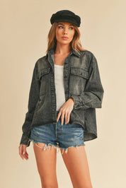 Genny Denim TopRevamp your style with this Genny faded denim shirt. Featuring button closure, spread collar, and long sleeves with button cuffs. The high-low hem adds a touch of edge, while the button-close chest pockets offer functionality and flair. Ele