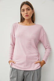 Hacci Wide Neck TopMeet our Flowy Wide Neck Knit Top, the epitome of comfort and style. Crafted from ultra-soft knit fabric, this top offers a luxurious feel against the skin. Its flattering wide neckline adds a touch of elegance, while the flowy hemline