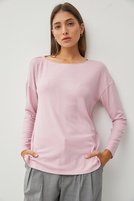 Hacci Wide Neck TopMeet our Flowy Wide Neck Knit Top, the epitome of comfort and style. Crafted from ultra-soft knit fabric, this top offers a luxurious feel against the skin. Its flattering wide neckline adds a touch of elegance, while the flowy hemline