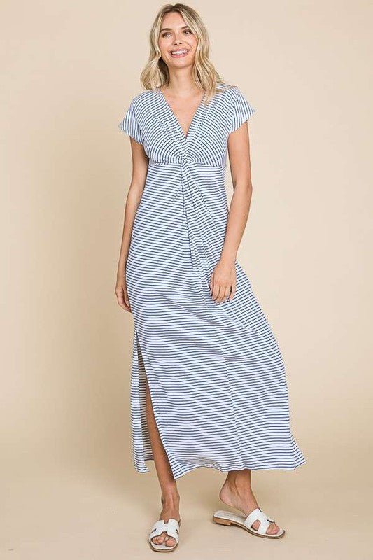 Justine Twist Front MaxiElevate your style with our Twist Detail Maxi Striped Dress, designed for the modern woman who values both comfort and chicness. Featuring a flattering front twist detail, cap sleeves, and a V-neckline, this dress offers a sophisti