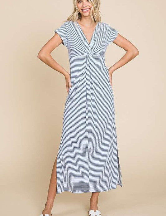 Justine Twist Front MaxiElevate your style with our Twist Detail Maxi Striped Dress, designed for the modern woman who values both comfort and chicness. Featuring a flattering front twist detail, cap sleeves, and a V-neckline, this dress offers a sophisti