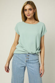 Kate Knot TopIntroducing our Kate Knot Top with Twist Hem Detail, a chic and versatile addition to your wardrobe. Designed with a twist hem detail, this top adds a modern touch to your everyday look. Crafted with comfort and style in mind, this top featur