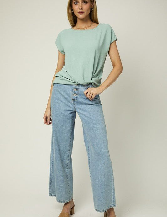 Kate Knot TopIntroducing our Kate Knot Top with Twist Hem Detail, a chic and versatile addition to your wardrobe. Designed with a twist hem detail, this top adds a modern touch to your everyday look. Crafted with comfort and style in mind, this top featur