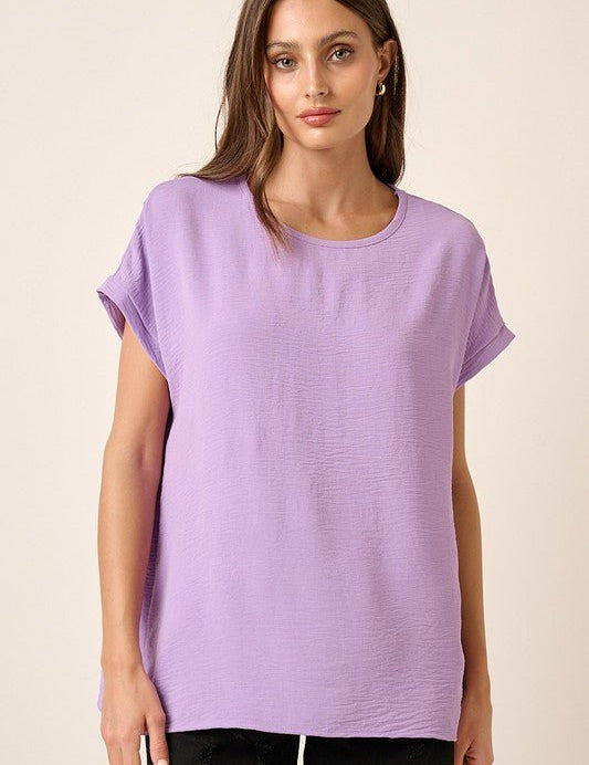 Lola Woven TopIntroducing our Airflow Woven Fabric Oversized Top, the ultimate blend of comfort and style for your spring and summer wardrobe! Crafted from lightweight airflow woven fabric, this top is designed to keep you cool and chic in warmer weather.