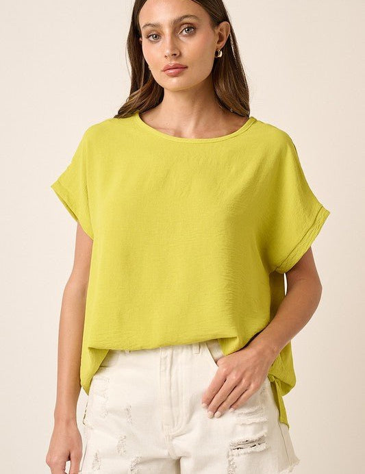 Lola Woven TopIntroducing our Airflow Woven Fabric Oversized Top, the ultimate blend of comfort and style for your spring and summer wardrobe! Crafted from lightweight airflow woven fabric, this top is designed to keep you cool and chic in warmer weather.