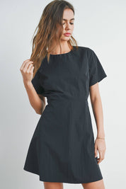 Luella Tie Back Mini DressThe Tie Back Mini Dress is a chic and versatile wardrobe staple that effortlessly combines style and comfort. This fashionable dress features a flattering mini length, showcasing your legs while providing a trendy look. The defin