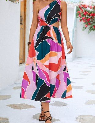 Nora Printed DressStep into summer with the Nora Printed Dress, a stunning one-shoulder design that exudes effortless elegance. Featuring a vibrant print and a small insert at the waist, this dress is perfect for making a statement at any occasion. The on