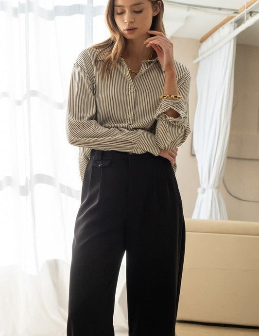 Pinstripe Button UpIntroducing our sophisticated Pinstripe Silk-Like Fabric Button-Up Shirt, a timeless addition to your wardrobe that effortlessly combines style and luxury. Crafted from a premium silk-like fabric, this button-up shirt exudes elegance an