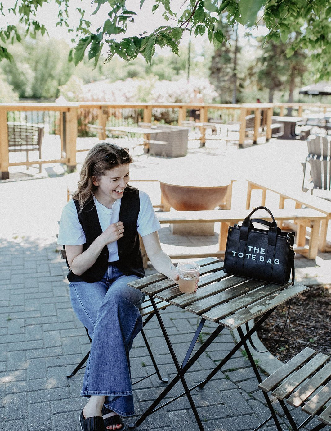 The Tote Bag with Shoulder StrapOnce the item sells out we will be selling a PRE-ORDER - available within 2 weeks Elevate your everyday style with "The Tote Bag with Shoulder Strap," designed to seamlessly blend practicality and chic aesthetics. This slee