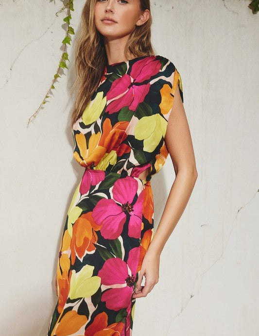 Tropical Burst DressIntroducing our enchanting Floral Satin Dress, a captivating blend of elegance and versatility. Crafted to elevate your style for any occasion, this dress embodies timeless grace with modern flair. Adorned with a high neckline and deli
