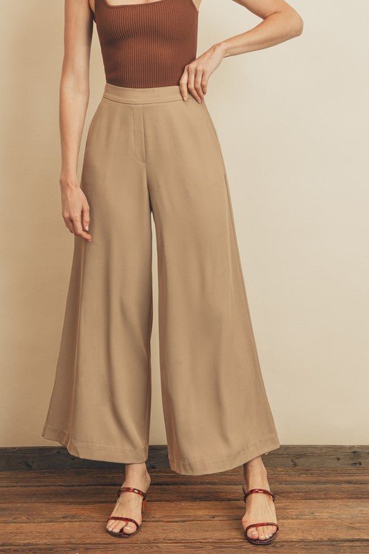 Ultimate Trouser PantIntroducing our latest addition to effortless style and comfort – our Pull-On Pants with Extra Wide Legs. Crafted with a keen eye for both fashion and functionality, these pants feature an elasticized back waistband, ensuring a snug y