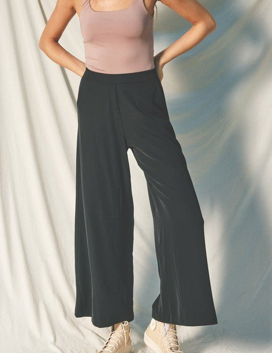 Ultimate Trouser PantIntroducing our latest addition to effortless style and comfort – our Pull-On Pants with Extra Wide Legs. Crafted with a keen eye for both fashion and functionality, these pants feature an elasticized back waistband, ensuring a snug y