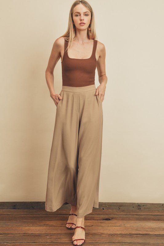 Ultimate Trouser PantIntroducing our latest addition to effortless style and comfort – our Pull-On Pants with Extra Wide Legs. Crafted with a keen eye for both fashion and functionality, these pants feature an elasticized back waistband, ensuring a snug y