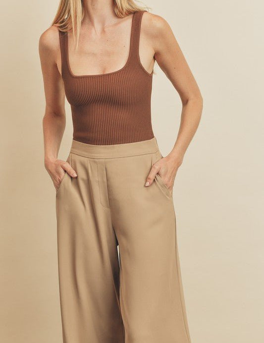 Ultimate Trouser PantIntroducing our latest addition to effortless style and comfort – our Pull-On Pants with Extra Wide Legs. Crafted with a keen eye for both fashion and functionality, these pants feature an elasticized back waistband, ensuring a snug y