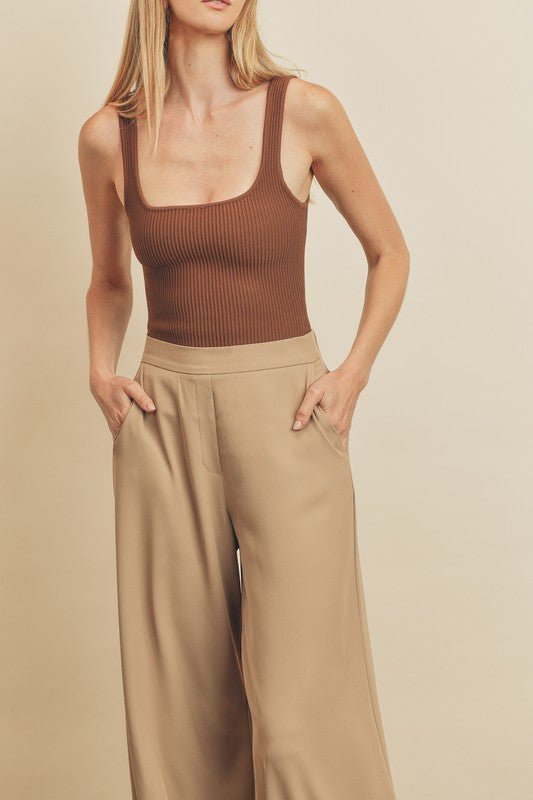 Ultimate Trouser PantIntroducing our latest addition to effortless style and comfort – our Pull-On Pants with Extra Wide Legs. Crafted with a keen eye for both fashion and functionality, these pants feature an elasticized back waistband, ensuring a snug y