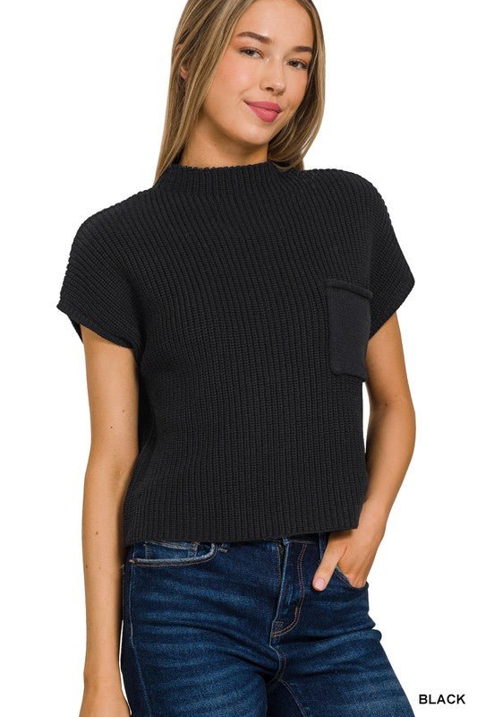 Zana SweaterIntroducing our Zana Cropped Sweater, a versatile addition to your wardrobe that combines comfort with contemporary style. Designed with a modern silhouette, featuring a mock neck and dropped shoulder short sleeves, it offers a chic and relaxe