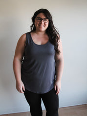 Curve Classic Tank - FINAL SALEPRODUCT DESCRIPTION: This classic round neck tank top is a wardrobe staple. Emmas Closet is a staff & customer favourite, known for their soft and comfy fabrics that wear and wash oh so well! Made of a stretchy rayon modal f