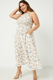 Iris Halter Neck Maxi Dress - FINAL SALEDESCRIPTION: Dainty floral print maxi dress with smocked bodice and adjustable straps Made In: Imported Content: 100% Rayon Washing Instructions: Hand Wash Cold / Hang to Dry Fit: TTS. Model is wearing size 1XIris H