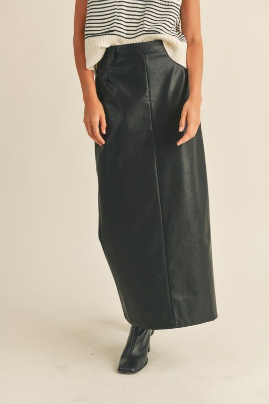 Liana Maxi Skirt - FINAL SALEAdd a touch of edge to your wardrobe with the Liana Skirt! Featuring a high rise waist and maxi length hem, this skirt is so fun to style in tons of different ways. Made of a soft faux leather fabric. SIZE & FIT Fit: This garm