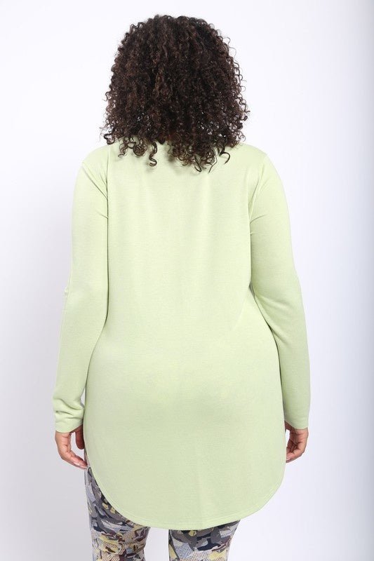 Lisa Basic Curve Long Sleeve Top - FINAL SALEDESCRIPTION: This no-frills long-sleeve top features curved bottom hems and slit on each side that goes all the way up to the hips. Wed recommend pairing it with leggings or denim pants for an eclectic look. Ma