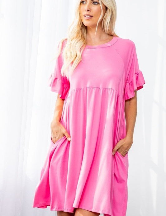 Lisa Ruffle Sleeve DressPRODUCT DESCRIPTION: The Lisa Ruffle Dress is an easy to wear piece for the spring & summer that grows with you and can easily be worn post partum. Features a babydoll silhouette, a round neckline, short ruffle sleeves, and side po