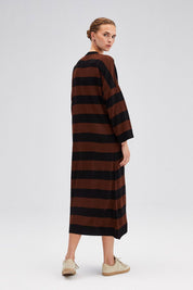 Orly Striped Knit Dress - FINAL SALEThis striped sweater dress features a fun neutral stripe pattern, round neckline, & bell sleeves, all in a soft & cozy knit. Pair with tall boots and your favourite long coat for a chic look. SIZE & FIT Fit: This garmen