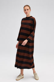 Orly Striped Knit Dress - FINAL SALEThis striped sweater dress features a fun neutral stripe pattern, round neckline, & bell sleeves, all in a soft & cozy knit. Pair with tall boots and your favourite long coat for a chic look. SIZE & FIT Fit: This garmen