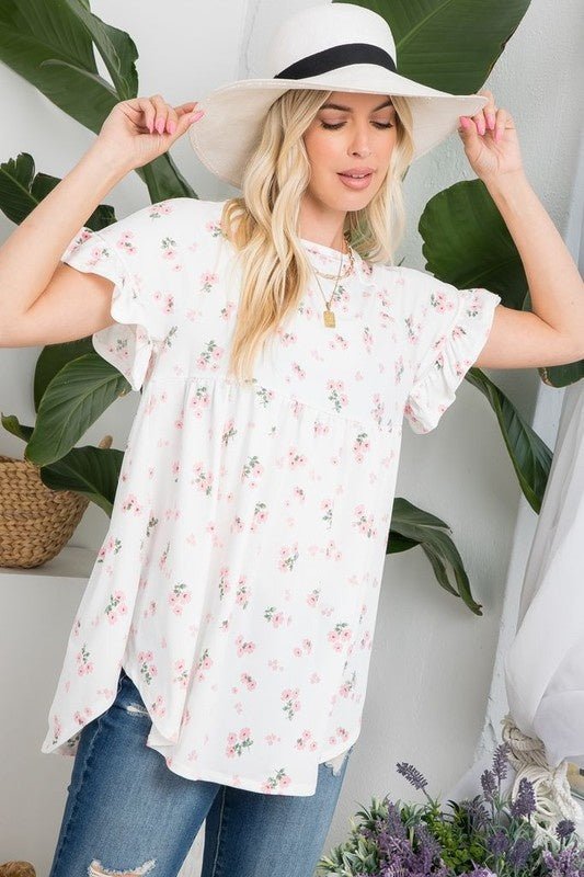 Peony Babydoll TopPRODUCT DESCRIPTION: The Peony Babydoll Top is a comfortable and versatile piece thats easy to wear and grows with you! Featuring a dainty floral print with a round neckline and short sleeves in a classic babydoll silhouette. SIZE & FIT