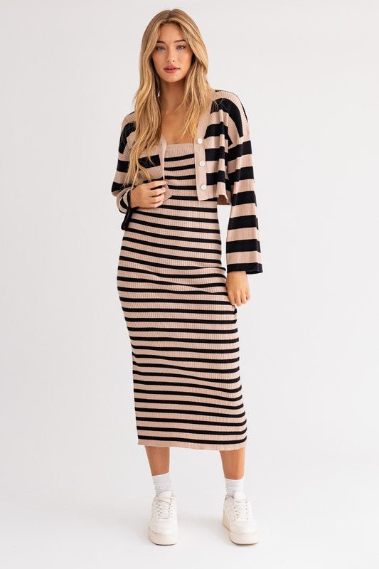 Rachel Striped Tube Dress - FINAL SALEThis versatile tube dress features a strapless neckline, midi length skirt, and hugs in all the right places. Made of a soft ribbed fabric with tons of stretch to keep you comfy all day, and all in a classic stripe pa