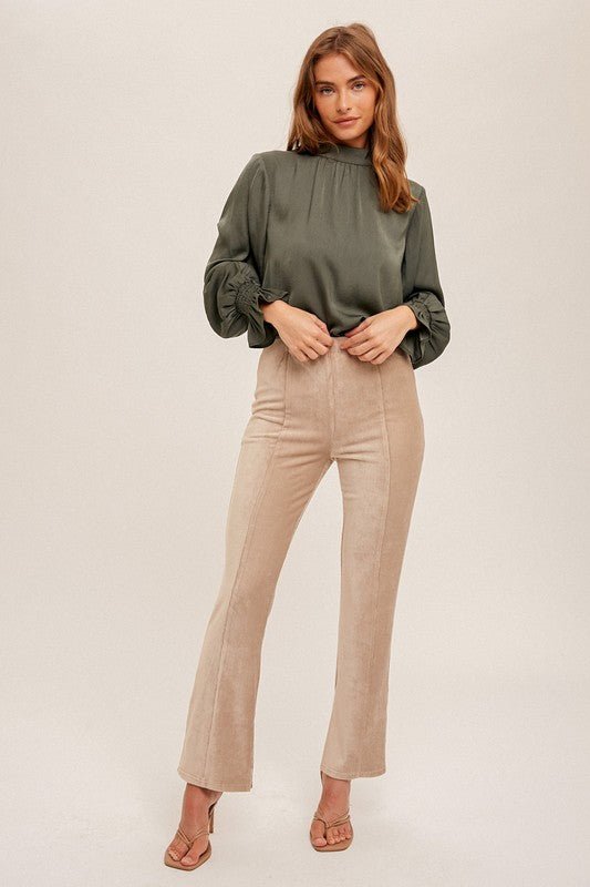 Raven Split Hem PantThe perfect blend of trendy and comfy. Made of a soft brushed corduroy fabric, these pants feature a high rise elastic waist. With plenty of stretch to keep you comfy throughout the day, you'll never want to take them off! Featuring a