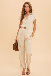 Shona Collared JumpsuitPRODUCT DESCRIPTION: Live easy in the Shona Collared Jumpsuit. Made of a lightweight woven fabric, this jumpsuit is the perfect thing to take you from brunch to errands and everything in between. Features a straight leg fit, elastic