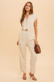 Shona Collared JumpsuitPRODUCT DESCRIPTION: Live easy in the Shona Collared Jumpsuit. Made of a lightweight woven fabric, this jumpsuit is the perfect thing to take you from brunch to errands and everything in between. Features a straight leg fit, elastic